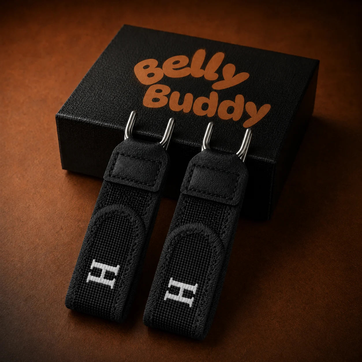 BellyBuddy black buckle-free belt pair with packaging